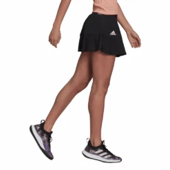 Adidas Women's Tennis Primeblue Aeroknit Match Skirt (Black) -Racquetguys H31425 APP on model walking white
