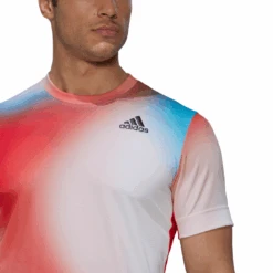 Adidas Men's Melbourne FreeLift Printed Top (White/Vivid Red/Black) 18 Adidas Men's Melbourne FreeLift Printed Top (White/Vivid Red/Black) -Racquetguys H67126 APP on model detail 1 white